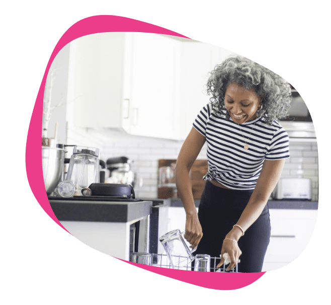 Woman making steady progress on her home organizing journey with Organize & Flow