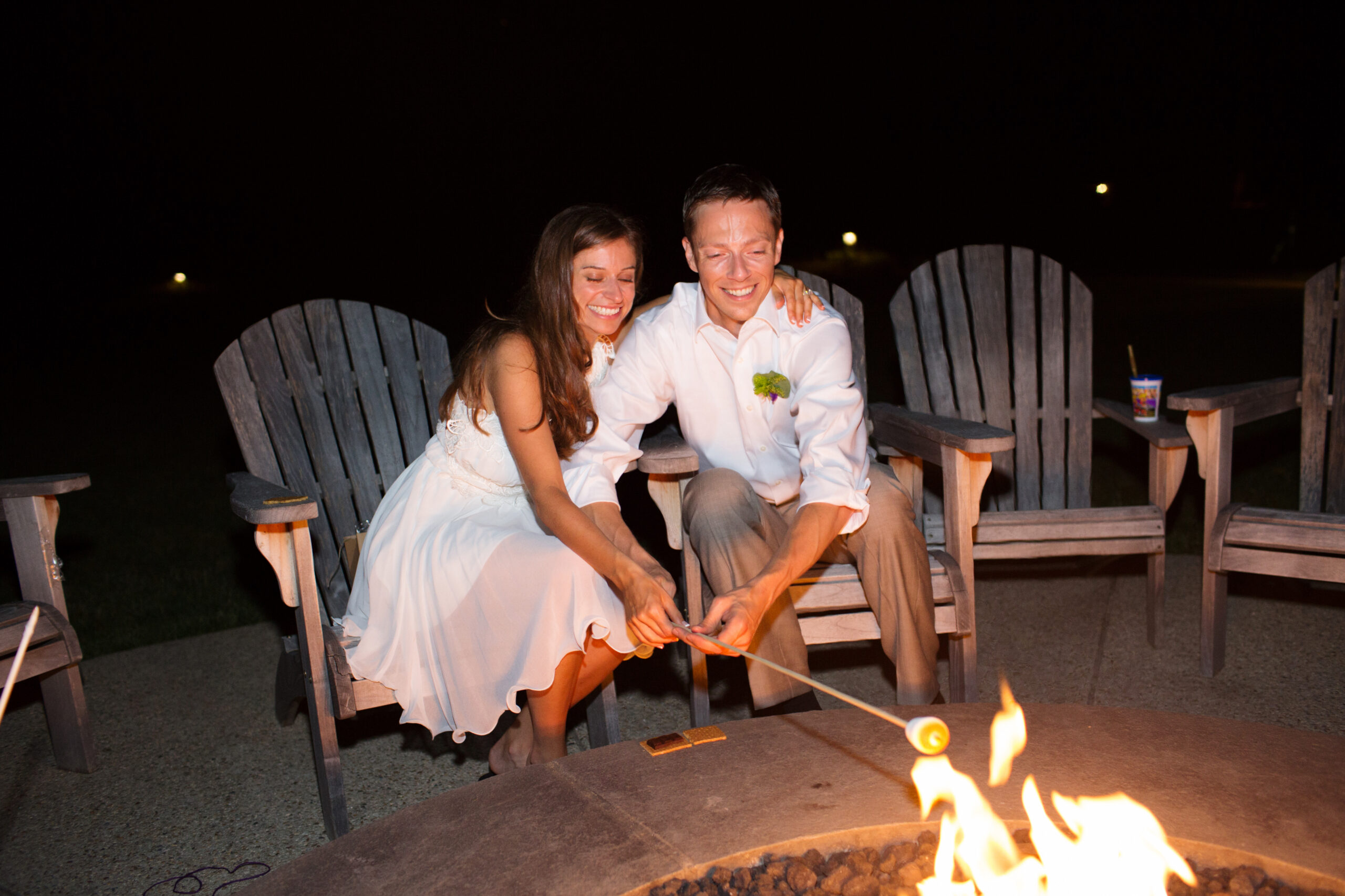 Having a jolly ole' time roasting s'mores by the fire pit!!!